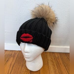 City Hunter Black Knit Hat with Red Lips and Racoon Fur Pom Pom